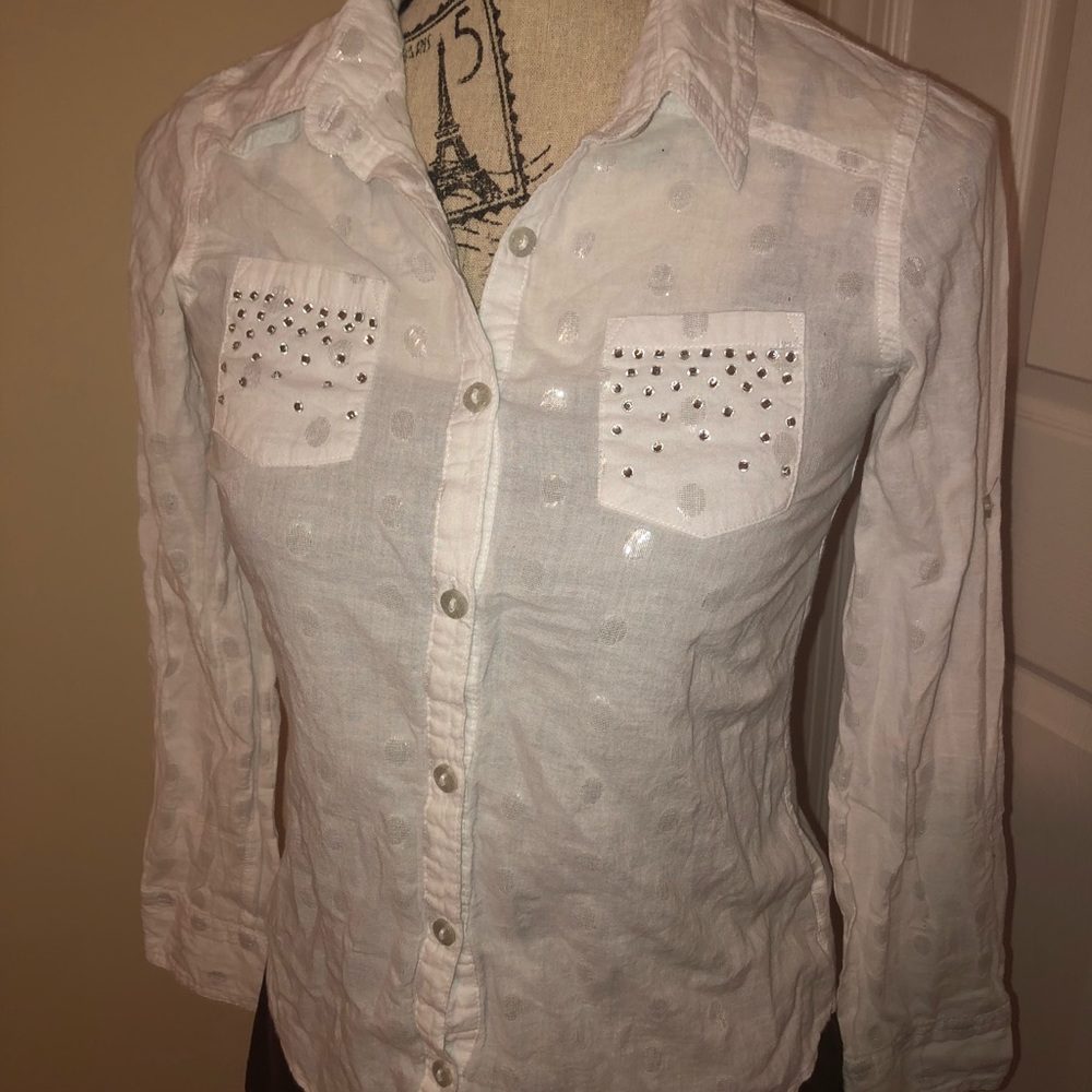 A rhinestone and sparkly long sleeve blouse